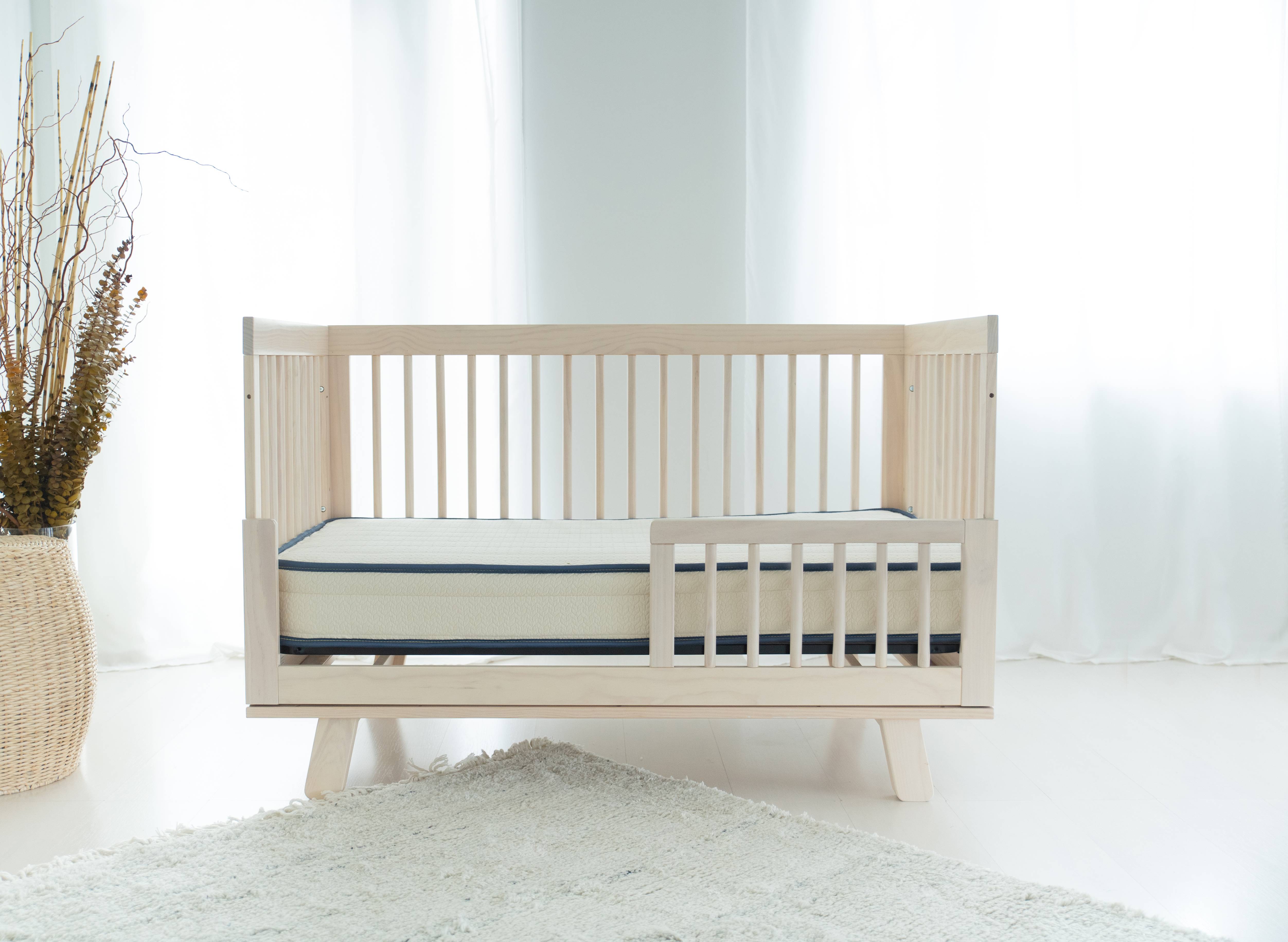 emily crib mattress vs newton air